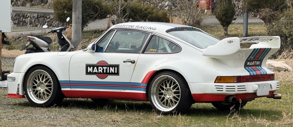 Porsche header